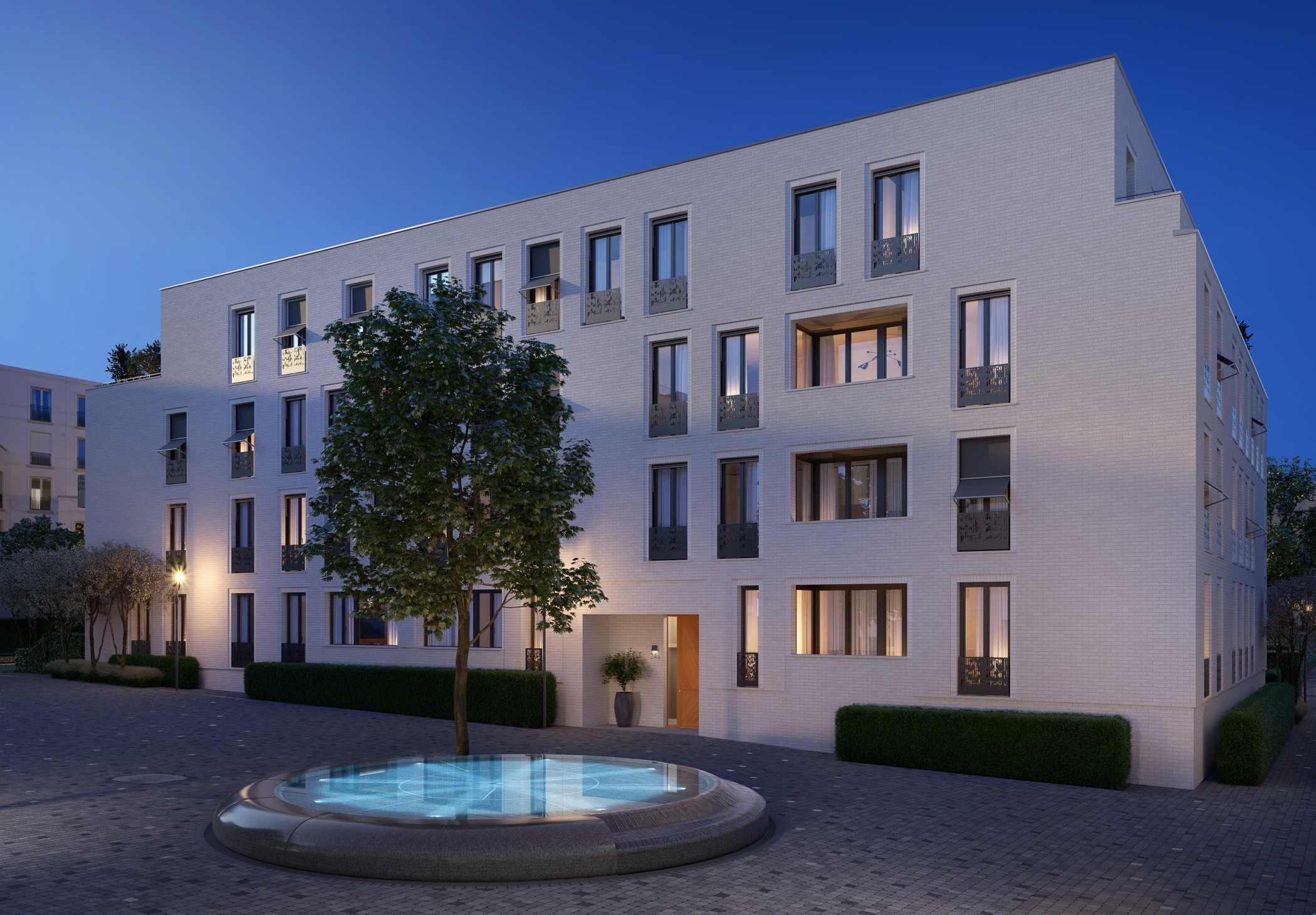 Hochwertiges Aussenrendering der Sophie mit Brunnen und Eingangsbereich in der blauen Stunde